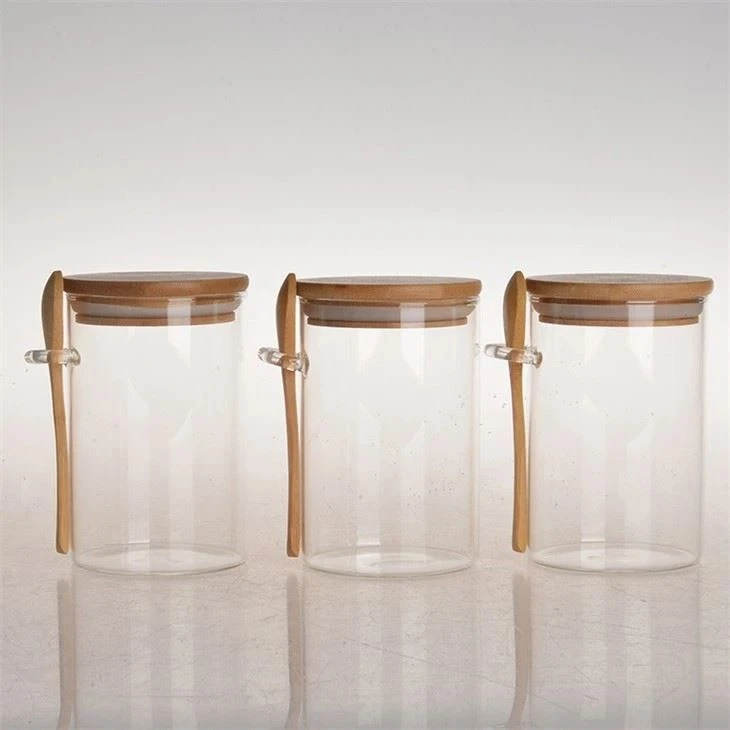 Glass Jars with Bamboo Lids Spoons 2 Glass Jars with Bamboo Lids Spoons 2